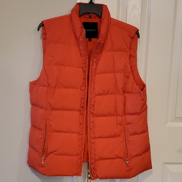 orange puffer vest